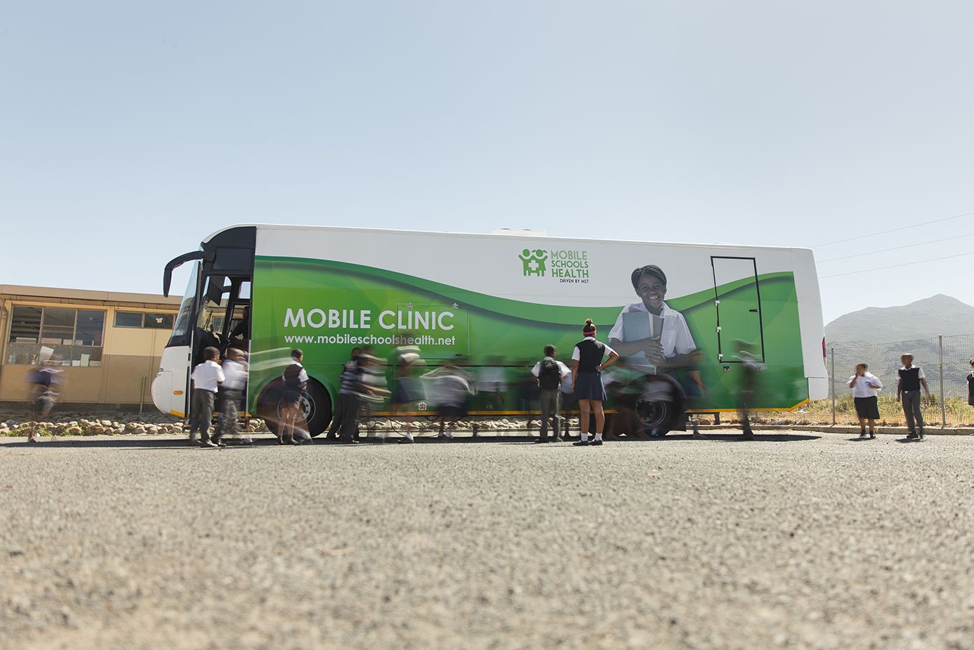 Mobile Schools Health bus visiting a school